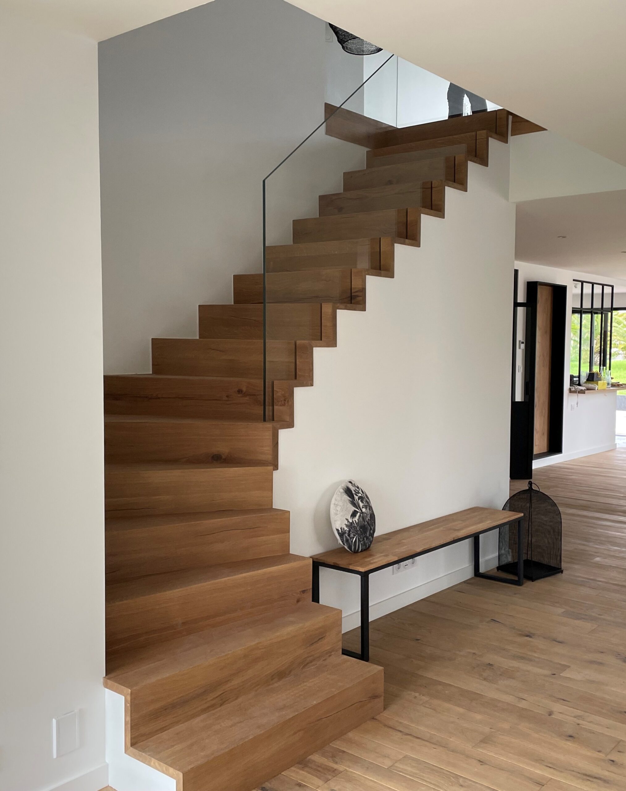 un escalier sur mesure tournant